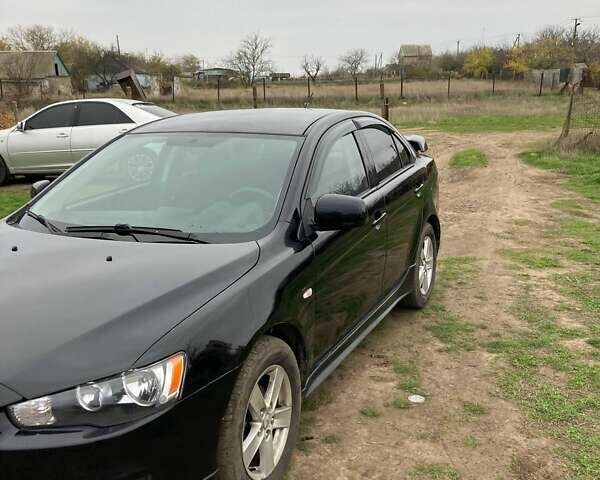 Чорний Міцубісі Lancer, об'ємом двигуна 2 л та пробігом 180 тис. км за 7500 $, фото 4 на Automoto.ua