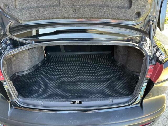 Чорний Міцубісі Lancer, об'ємом двигуна 2 л та пробігом 230 тис. км за 6650 $, фото 23 на Automoto.ua