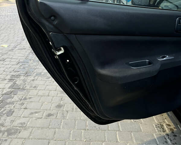 Чорний Міцубісі Lancer, об'ємом двигуна 1.6 л та пробігом 277 тис. км за 3900 $, фото 9 на Automoto.ua