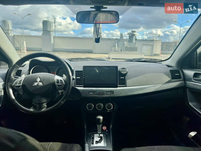 Мицубиси Лансер 2008 в Киеве на Automoto.ua Черный Мицубиси Лансер, объемом двигателя 2 л и пробегом 219 тыс. км за 6500 $, фото 9 на Automoto.ua