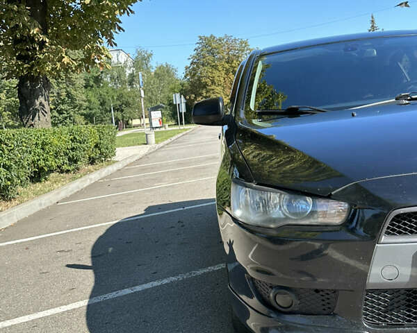 Чорний Міцубісі Lancer, об'ємом двигуна 2 л та пробігом 169 тис. км за 8200 $, фото 7 на Automoto.ua