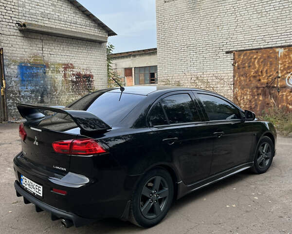 Мицубиси Лансер 2008 в Чернигове на Automoto.ua Черный Мицубиси Лансер, объемом двигателя 2 л и пробегом 254 тыс. км за 7500 $, фото 2 на Automoto.ua