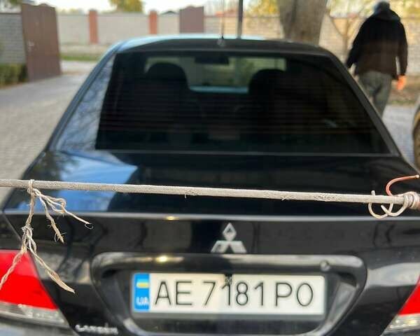 Чорний Міцубісі Lancer, об'ємом двигуна 1.6 л та пробігом 324 тис. км за 3800 $, фото 8 на Automoto.ua