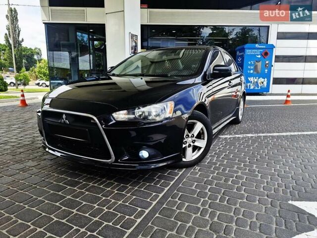 Чорний Міцубісі Lancer, об'ємом двигуна 2 л та пробігом 240 тис. км за 7850 $, фото 9 на Automoto.ua