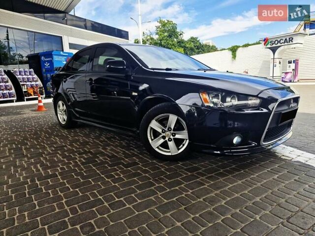 Чорний Міцубісі Lancer, об'ємом двигуна 2 л та пробігом 240 тис. км за 7850 $, фото 19 на Automoto.ua