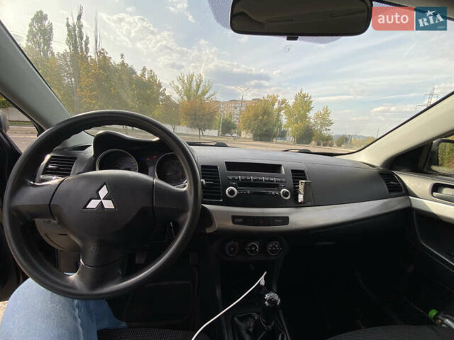 Черный Мицубиси Лансер, объемом двигателя 1.5 л и пробегом 219 тыс. км за 5500 $, фото 12 на Automoto.ua
