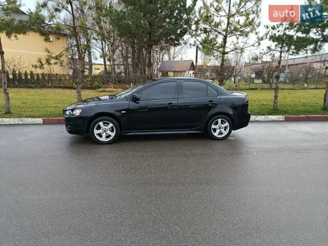 Черный Мицубиси Лансер, объемом двигателя 2 л и пробегом 200 тыс. км за 5100 $, фото 2 на Automoto.ua