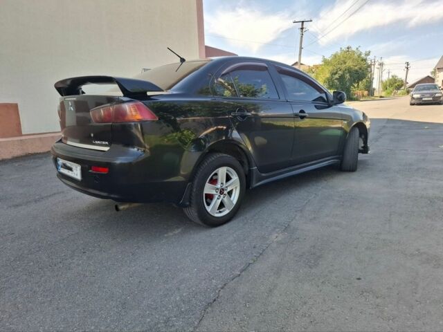 Чорний Міцубісі Lancer, об'ємом двигуна 2 л та пробігом 230 тис. км за 6650 $, фото 3 на Automoto.ua