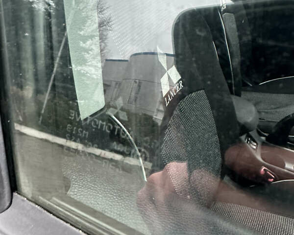 Чорний Міцубісі Lancer, об'ємом двигуна 1.5 л та пробігом 111 тис. км за 6999 $, фото 33 на Automoto.ua