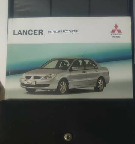 Чорний Міцубісі Lancer, об'ємом двигуна 1.6 л та пробігом 300 тис. км за 5500 $, фото 12 на Automoto.ua