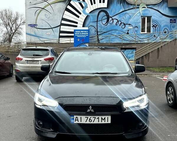 Черный Мицубиси Лансер, объемом двигателя 2 л и пробегом 217 тыс. км за 7000 $, фото 37 на Automoto.ua