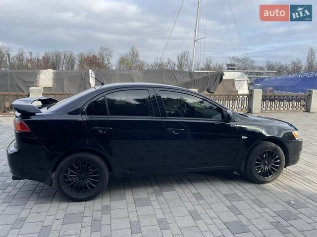 Чорний Міцубісі Lancer, об'ємом двигуна 1.5 л та пробігом 184 тис. км за 6000 $, фото 5 на Automoto.ua