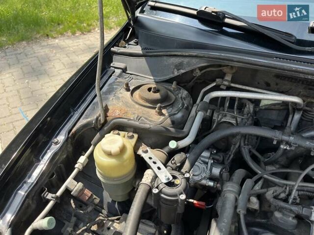 Чорний Міцубісі Lancer, об'ємом двигуна 1.6 л та пробігом 296 тис. км за 4200 $, фото 9 на Automoto.ua