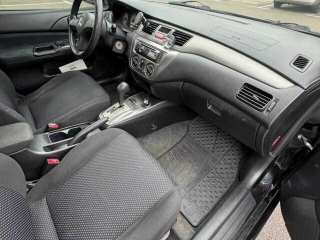 Чорний Міцубісі Lancer, об'ємом двигуна 1.6 л та пробігом 245 тис. км за 4500 $, фото 20 на Automoto.ua