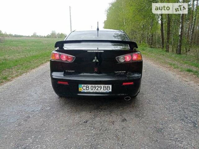 Чорний Міцубісі Lancer, об'ємом двигуна 2 л та пробігом 170 тис. км за 7600 $, фото 6 на Automoto.ua