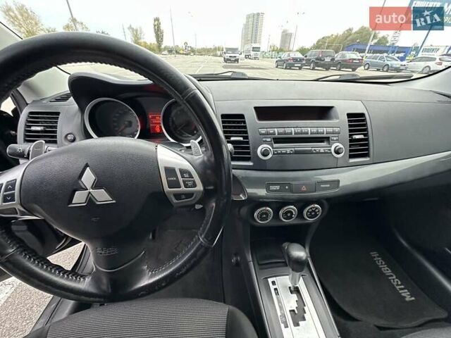 Чорний Міцубісі Lancer, об'ємом двигуна 2 л та пробігом 199 тис. км за 7900 $, фото 29 на Automoto.ua