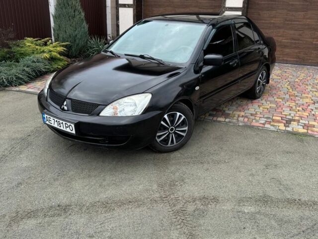 Чорний Міцубісі Lancer, об'ємом двигуна 1.6 л та пробігом 220 тис. км за 3600 $, фото 5 на Automoto.ua