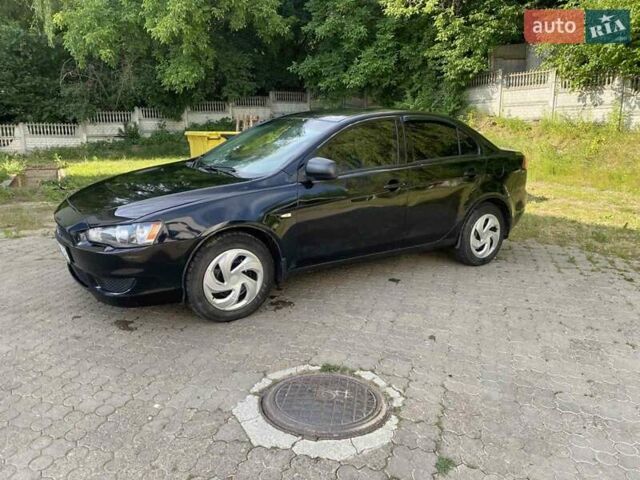 Черный Мицубиси Лансер, объемом двигателя 1.5 л и пробегом 264 тыс. км за 3750 $, фото 8 на Automoto.ua