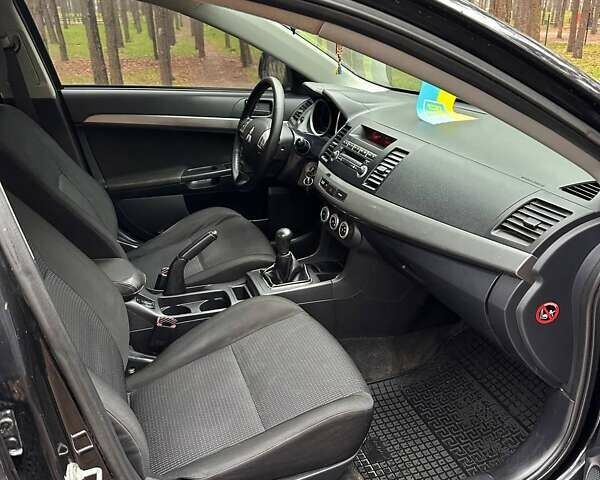 Чорний Міцубісі Lancer, об'ємом двигуна 2 л та пробігом 263 тис. км за 5750 $, фото 7 на Automoto.ua