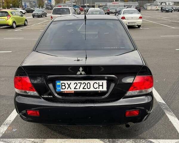 Чорний Міцубісі Lancer, об'ємом двигуна 1.6 л та пробігом 245 тис. км за 4500 $, фото 7 на Automoto.ua