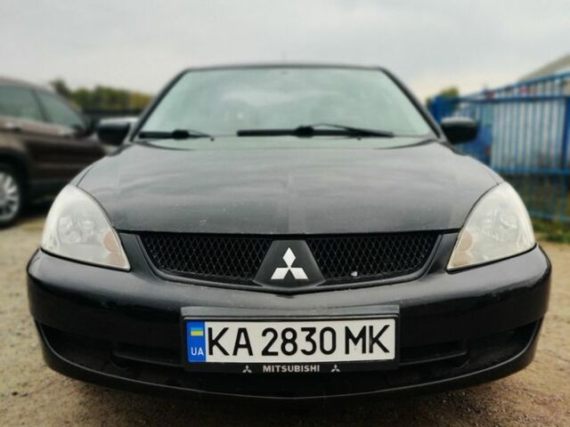 Чорний Міцубісі Lancer, об'ємом двигуна 1.6 л та пробігом 257 тис. км за 4200 $, фото 1 на Automoto.ua