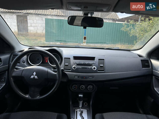 Чорний Міцубісі Lancer, об'ємом двигуна 1.5 л та пробігом 223 тис. км за 5699 $, фото 17 на Automoto.ua