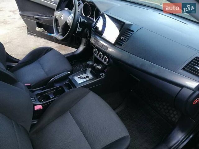 Мицубиси Лансер 2008 в Киеве на Automoto.ua Черный Мицубиси Лансер, объемом двигателя 2 л и пробегом 196 тыс. км за 5500 $, фото 23 на Automoto.ua
