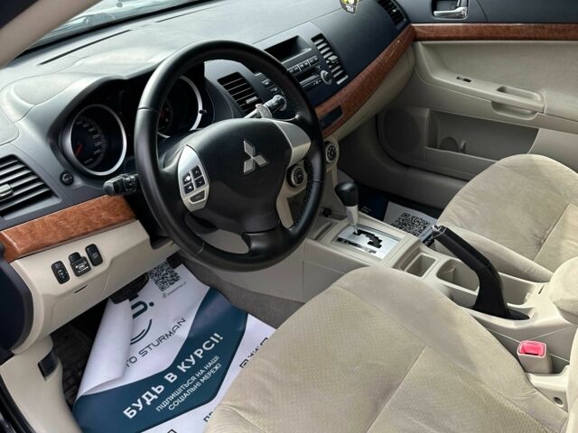 Чорний Міцубісі Lancer, об'ємом двигуна 2 л та пробігом 239 тис. км за 6900 $, фото 13 на Automoto.ua