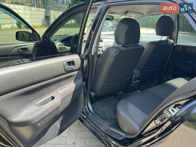 Чорний Міцубісі Lancer, об'ємом двигуна 1.6 л та пробігом 296 тис. км за 4200 $, фото 28 на Automoto.ua