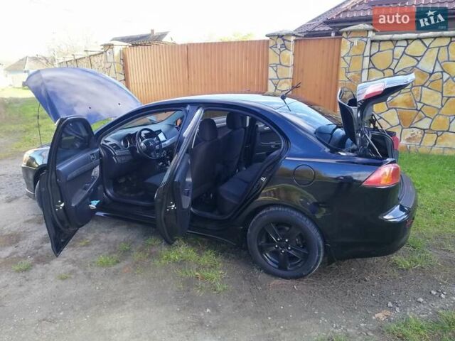 Мицубиси Лансер 2008 в Киеве на Automoto.ua Черный Мицубиси Лансер, объемом двигателя 2 л и пробегом 196 тыс. км за 5500 $, фото 33 на Automoto.ua