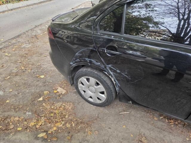 Мицубиси Лансер 2008 в Днепре (Днепропетровске) на Automoto.ua Черный Мицубиси Лансер, объемом двигателя 1.5 л и пробегом 200 тыс. км за 3500 $, фото 9 на Automoto.ua