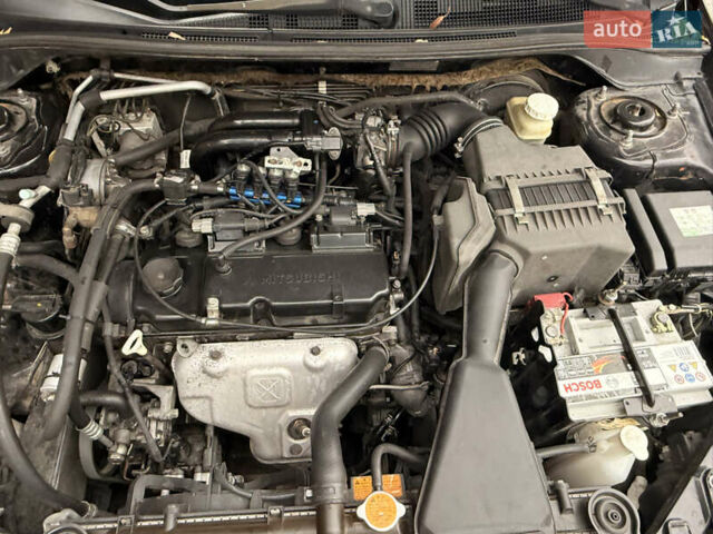 Чорний Міцубісі Lancer, об'ємом двигуна 1.6 л та пробігом 265 тис. км за 4700 $, фото 24 на Automoto.ua