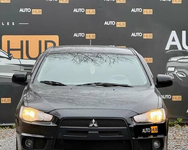 Чорний Міцубісі Lancer, об'ємом двигуна 2 л та пробігом 118 тис. км за 6200 $, фото 2 на Automoto.ua