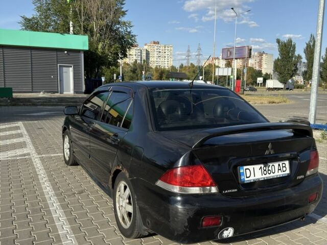 Чорний Міцубісі Lancer, об'ємом двигуна 1.6 л та пробігом 364 тис. км за 3000 $, фото 1 на Automoto.ua