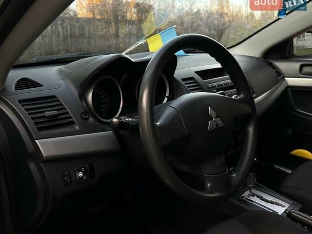 Черный Мицубиси Лансер, объемом двигателя 1.5 л и пробегом 285 тыс. км за 4800 $, фото 17 на Automoto.ua