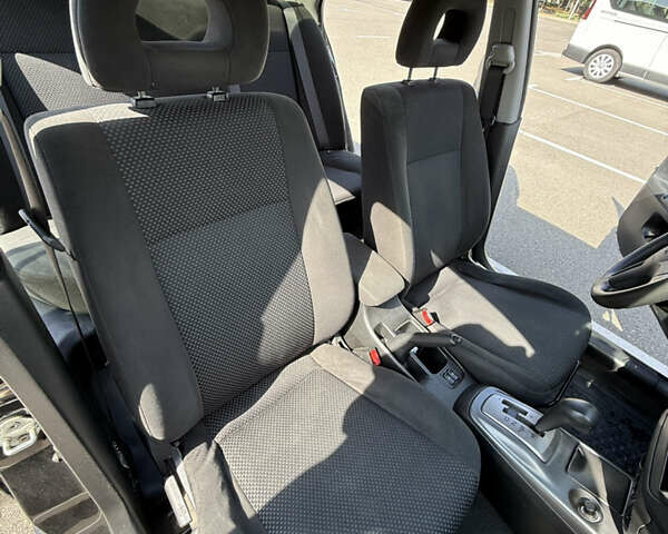 Черный Мицубиси Лансер, объемом двигателя 1.6 л и пробегом 321 тыс. км за 5000 $, фото 28 на Automoto.ua