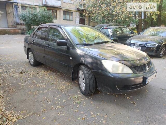 Чорний Міцубісі Lancer, об'ємом двигуна 1.6 л та пробігом 335 тис. км за 3100 $, фото 9 на Automoto.ua