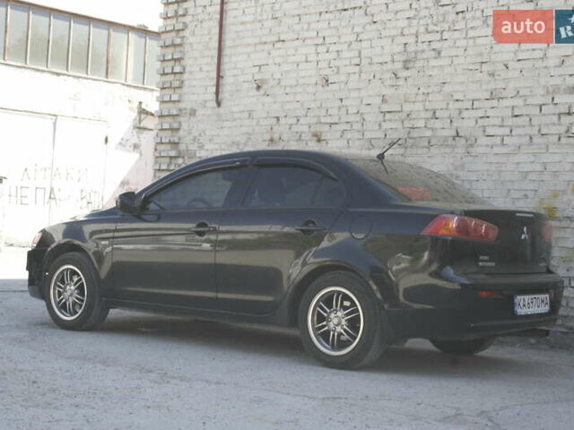 Черный Мицубиси Лансер, объемом двигателя 1.5 л и пробегом 110 тыс. км за 6950 $, фото 4 на Automoto.ua