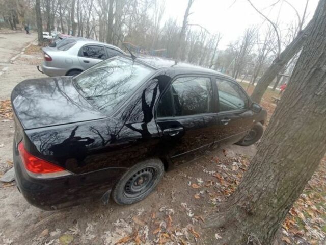 Черный Мицубиси Лансер, объемом двигателя 6 л и пробегом 190 тыс. км за 4500 $, фото 4 на Automoto.ua