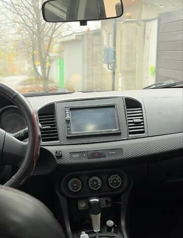 Чорний Міцубісі Lancer, об'ємом двигуна 1.5 л та пробігом 290 тис. км за 5499 $, фото 6 на Automoto.ua