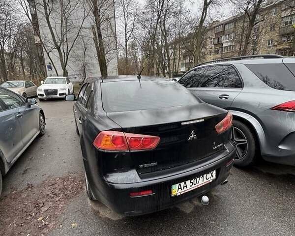 Черный Мицубиси Лансер, объемом двигателя 1.5 л и пробегом 126 тыс. км за 6499 $, фото 2 на Automoto.ua