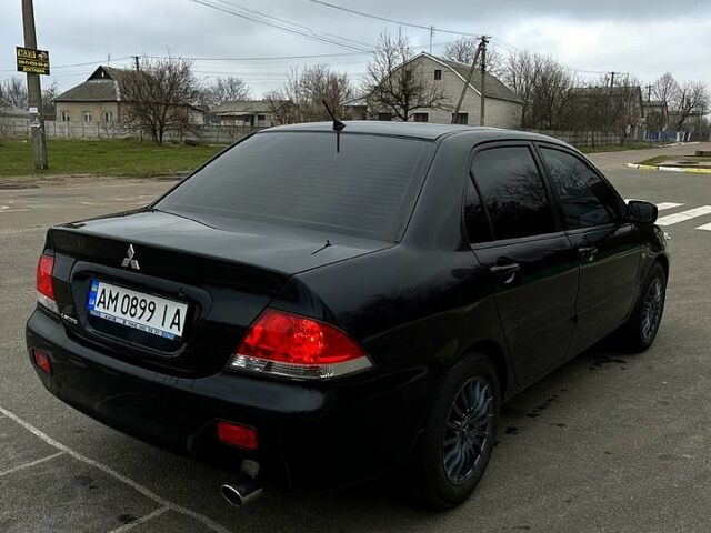 Чорний Міцубісі Lancer, об'ємом двигуна 1.6 л та пробігом 380 тис. км за 4350 $, фото 3 на Automoto.ua