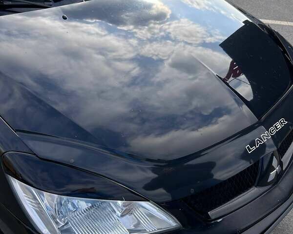 Чорний Міцубісі Lancer, об'ємом двигуна 1.6 л та пробігом 310 тис. км за 3500 $, фото 36 на Automoto.ua