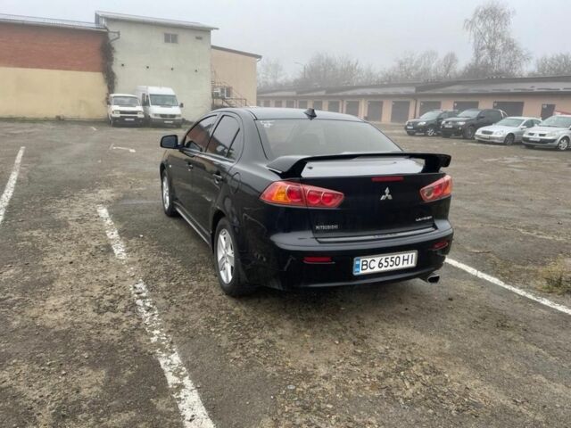 Чорний Міцубісі Lancer, об'ємом двигуна 2 л та пробігом 194 тис. км за 7300 $, фото 1 на Automoto.ua