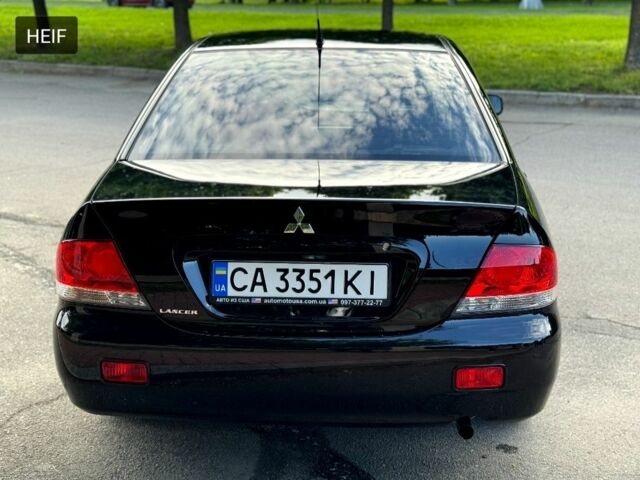 Чорний Міцубісі Lancer, об'ємом двигуна 1.6 л та пробігом 280 тис. км за 4350 $, фото 2 на Automoto.ua