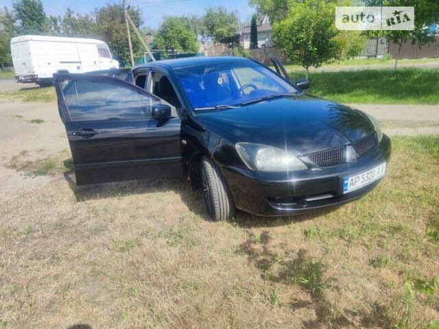 Чорний Міцубісі Lancer, об'ємом двигуна 0 л та пробігом 205 тис. км за 5250 $, фото 11 на Automoto.ua