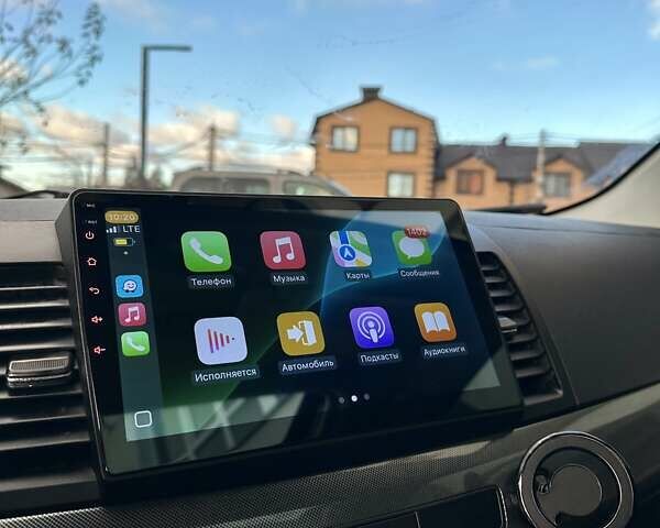 Черный Мицубиси Лансер, объемом двигателя 2 л и пробегом 150 тыс. км за 7850 $, фото 44 на Automoto.ua