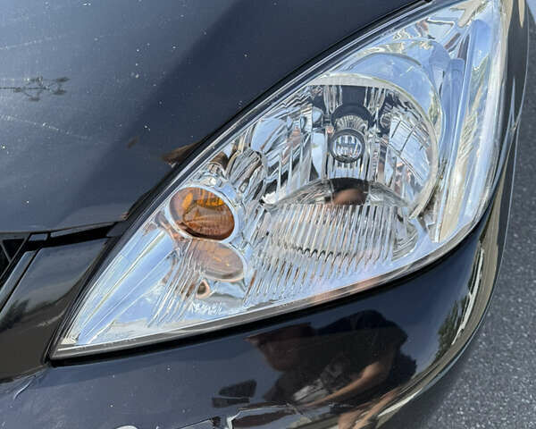 Черный Мицубиси Лансер, объемом двигателя 1.6 л и пробегом 321 тыс. км за 5000 $, фото 46 на Automoto.ua