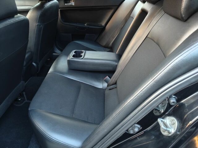 Черный Мицубиси Лансер, объемом двигателя 2 л и пробегом 245 тыс. км за 5600 $, фото 5 на Automoto.ua