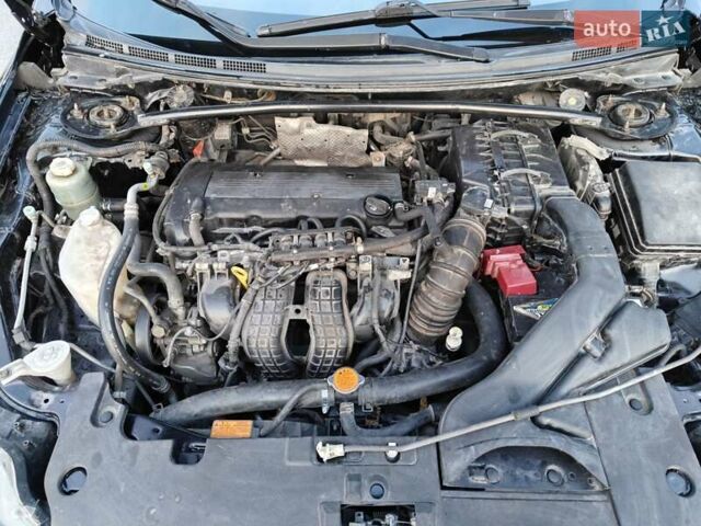 Черный Мицубиси Лансер, объемом двигателя 2 л и пробегом 245 тыс. км за 5600 $, фото 12 на Automoto.ua